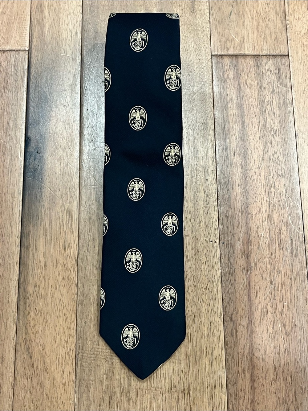 Diplomat Tie with Gold Crest Medallion
